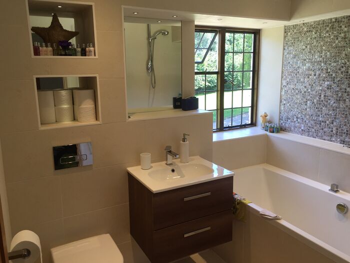 Family bathroom with bath and vanity unit